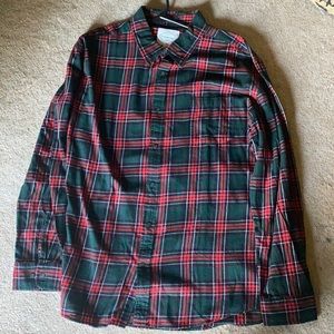 Hundred percent cotton button down collar shirt .